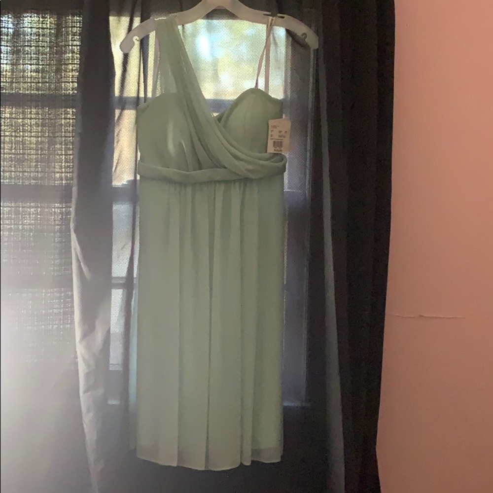 Mint green bridesmaid dress.